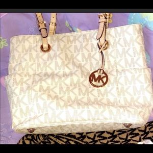 Used mk vanilla bag...